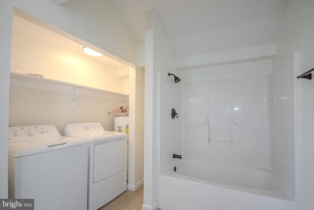 bathroom with tile patterned floors, separate washer and dryer, and shower / bathing tub combination