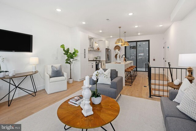 1936-38 E York St Unit 1, Philadelphia, PA 19125 - living area with light wood-type flooring, recessed lighting, baseboards, and stairs