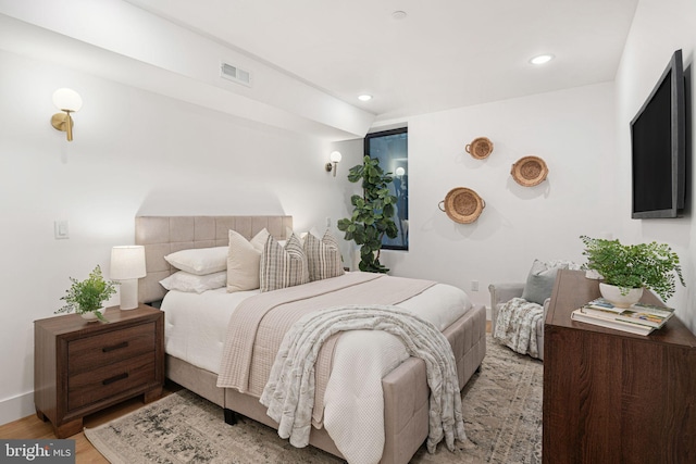 bedroom featuring light hardwood / wood-style floors