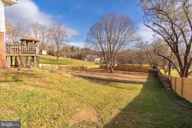 view of yard with a gazebo and a deck