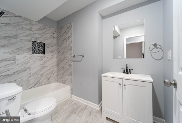 full bathroom with vanity, toilet, and tiled shower / bath combo