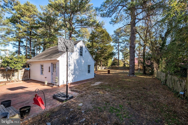 view of side of property featuring a deck