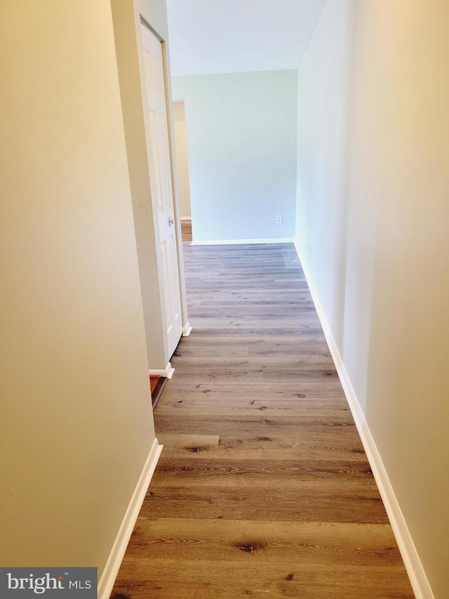 hallway featuring hardwood / wood-style floors