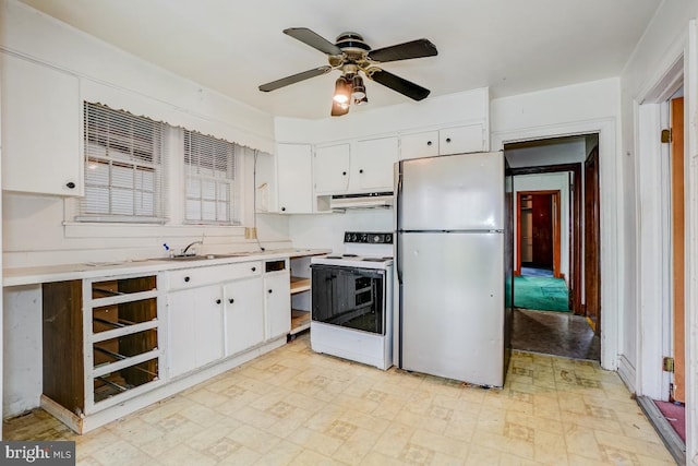 kitchen with white appliances, white cabinetry, extractor fan, and ceiling fan