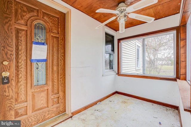 property entrance with ceiling fan