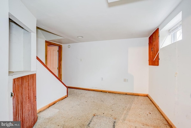 basement featuring carpet flooring