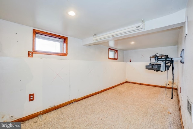 basement with carpet flooring