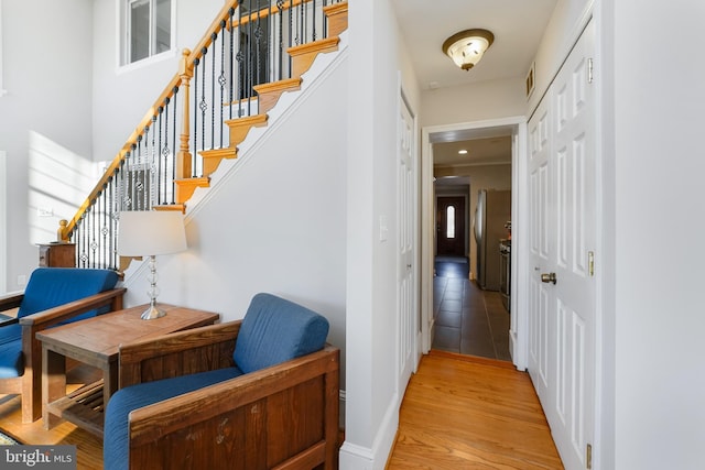 corridor featuring light hardwood / wood-style flooring