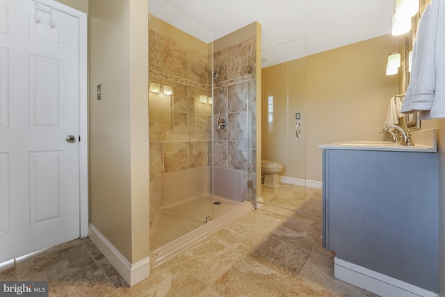 bathroom featuring sink, a shower with shower door, and toilet