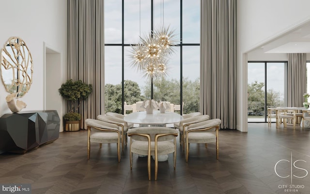 dining space featuring a chandelier, a high ceiling, and dark parquet flooring