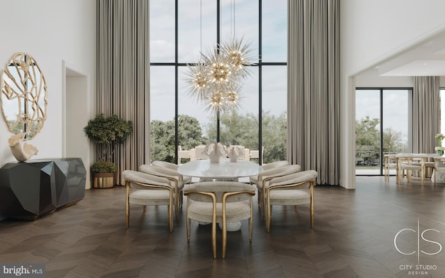 dining area featuring dark parquet floors, a high ceiling, and an inviting chandelier