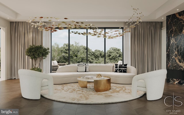 living room with a notable chandelier and parquet flooring