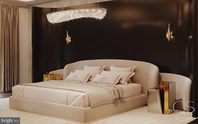 bedroom featuring a notable chandelier