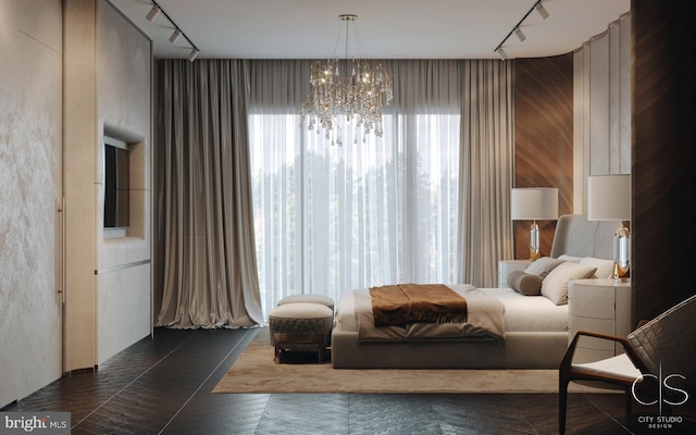 bedroom featuring track lighting, an inviting chandelier, dark tile patterned floors, and wooden walls