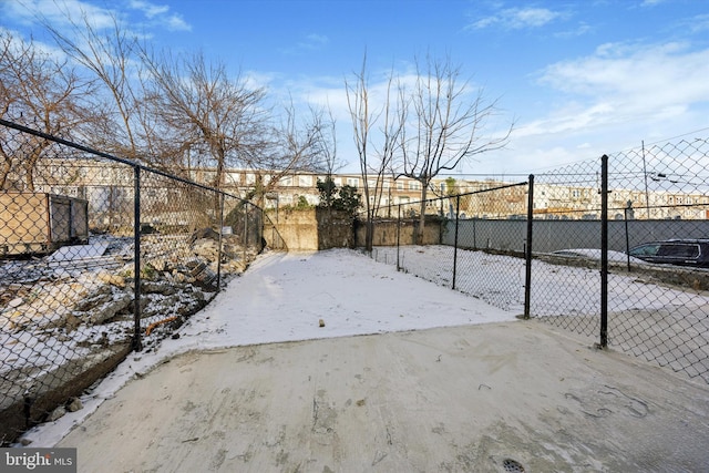 view of yard covered in snow