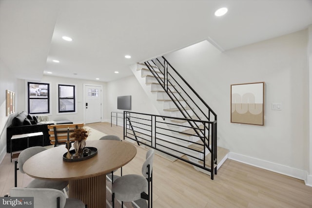 dining area with light hardwood / wood-style flooring