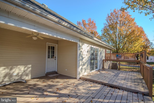 wooden terrace featuring ceiling fan