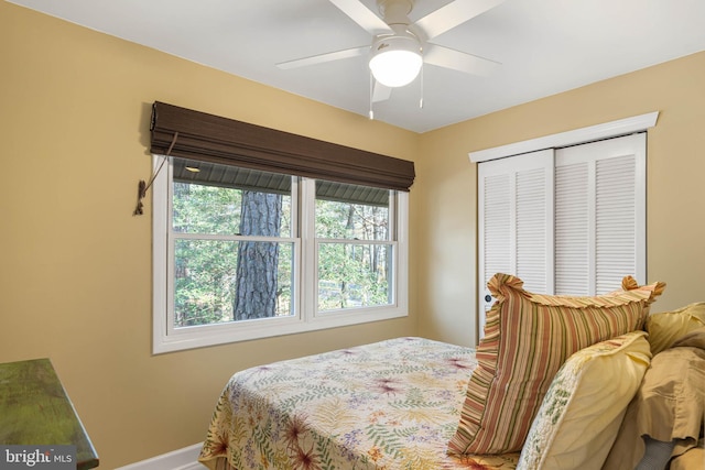 bedroom with a closet and ceiling fan