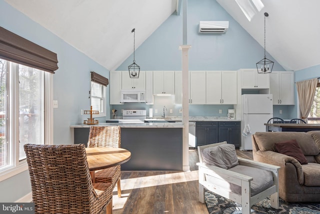 kitchen featuring white cabinetry, white appliances, and high vaulted ceiling