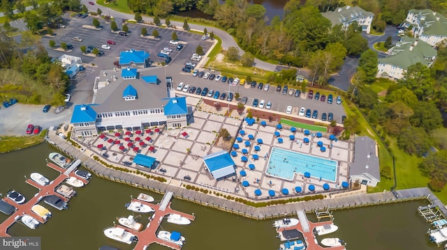 birds eye view of property featuring a water view