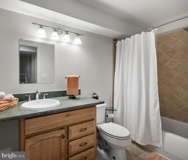 full bathroom with vanity, shower / bath combination with curtain, and toilet