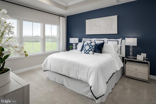 bedroom with light carpet