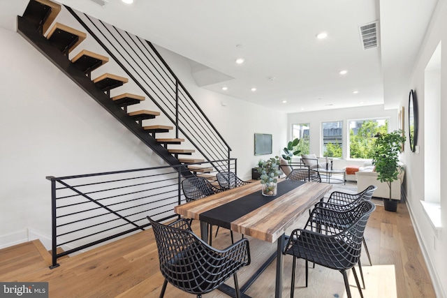 dining space with light wood-type flooring