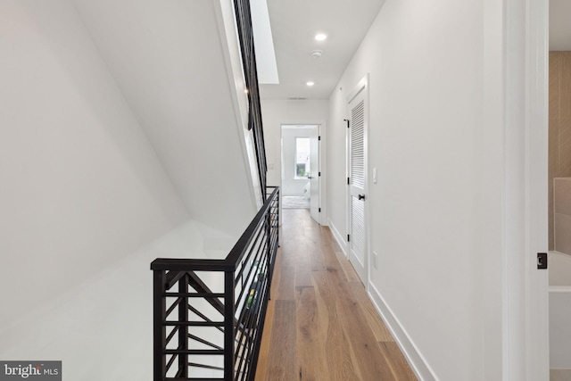 hall featuring hardwood / wood-style flooring