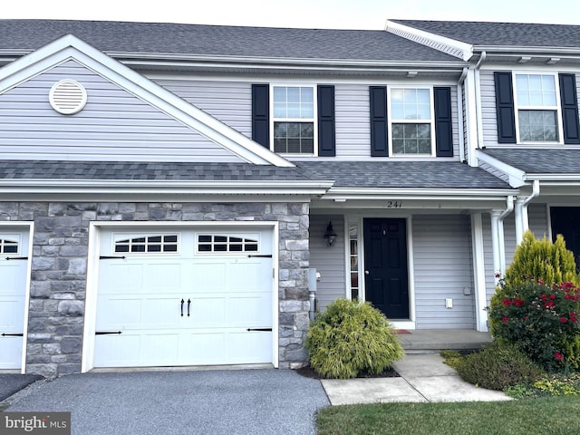 view of front of property featuring a garage