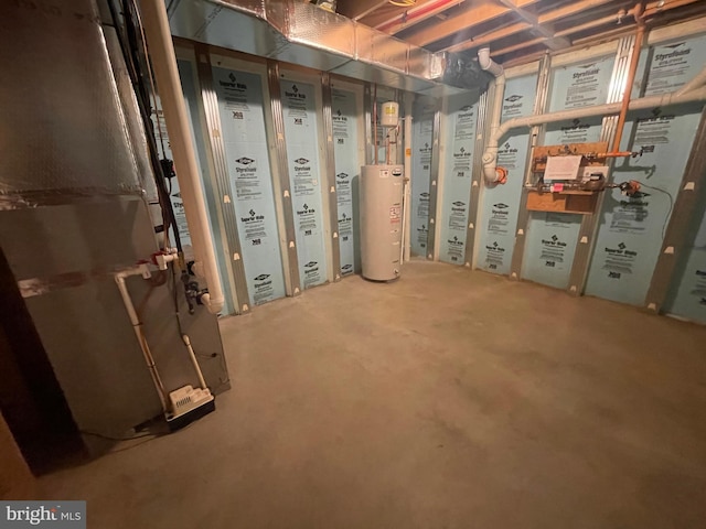 basement featuring heating unit and water heater