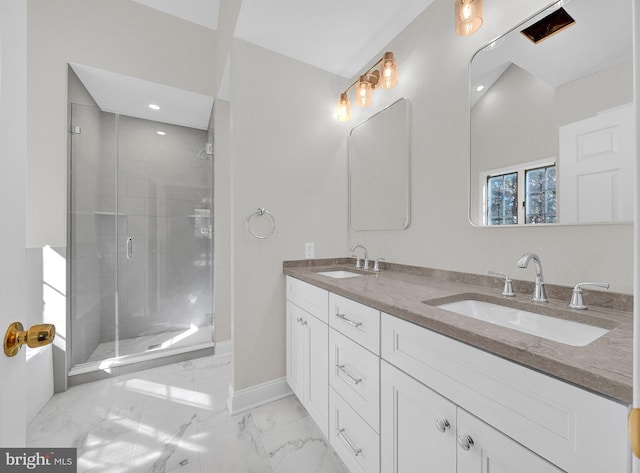 bathroom with vanity and an enclosed shower