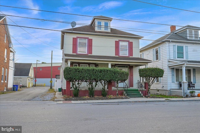 view of front property featuring a porch