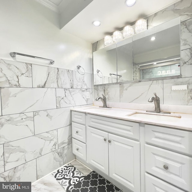 bathroom featuring vanity and crown molding