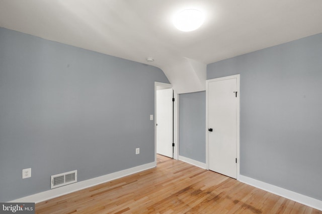 unfurnished room featuring wood-type flooring