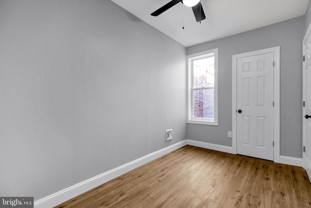 unfurnished room featuring light hardwood / wood-style flooring and ceiling fan