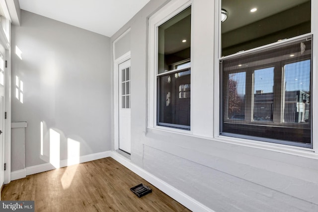 interior space with hardwood / wood-style floors