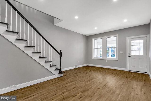 entryway with light hardwood / wood-style floors