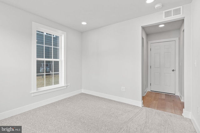 view of carpeted spare room