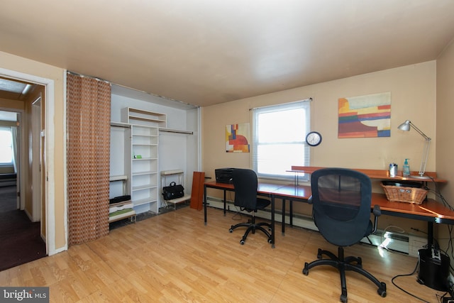 office area with light wood-style flooring