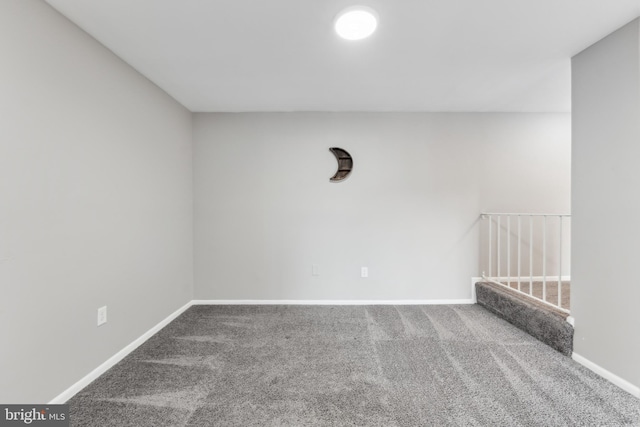 unfurnished room featuring carpet floors