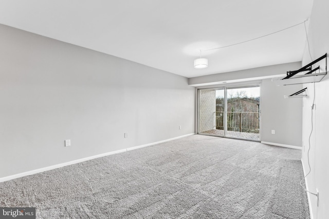 empty room featuring carpet floors