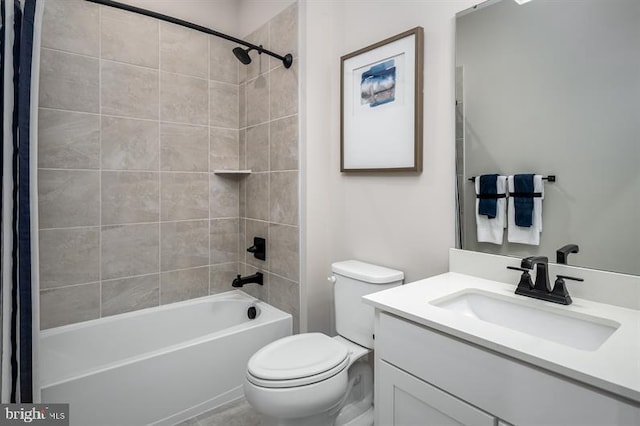 full bathroom featuring vanity, shower / bath combination with curtain, and toilet