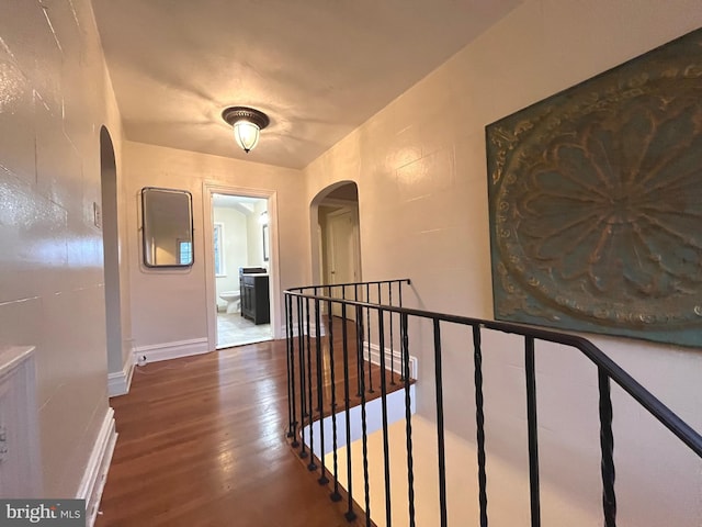 hall featuring dark wood-type flooring