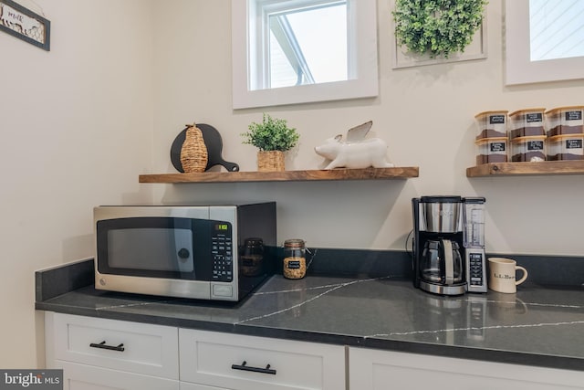 interior space featuring white cabinets