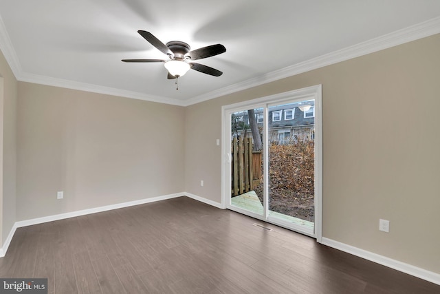 unfurnished room featuring dark hardwood / wood-style floors, ceiling fan, crown molding, and a wealth of natural light