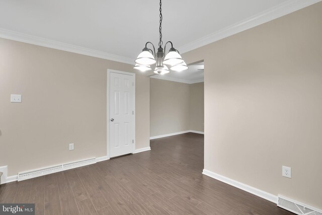 spare room with an inviting chandelier, dark hardwood / wood-style flooring, crown molding, and a baseboard heating unit