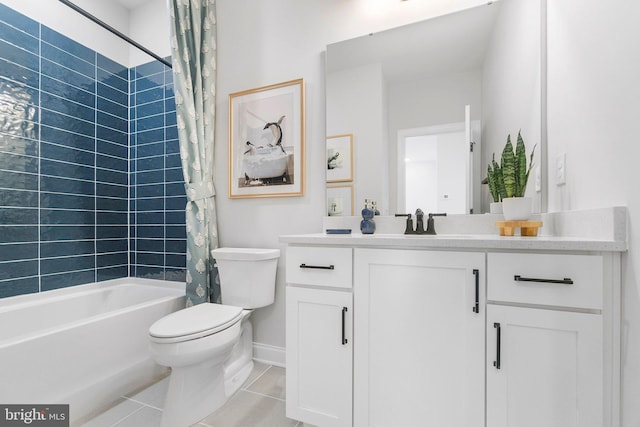 full bathroom featuring toilet, vanity, tile patterned floors, and shower / bathtub combination with curtain