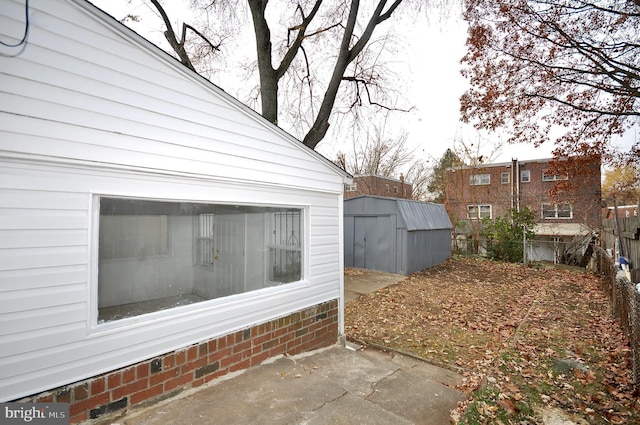 exterior space featuring a storage shed