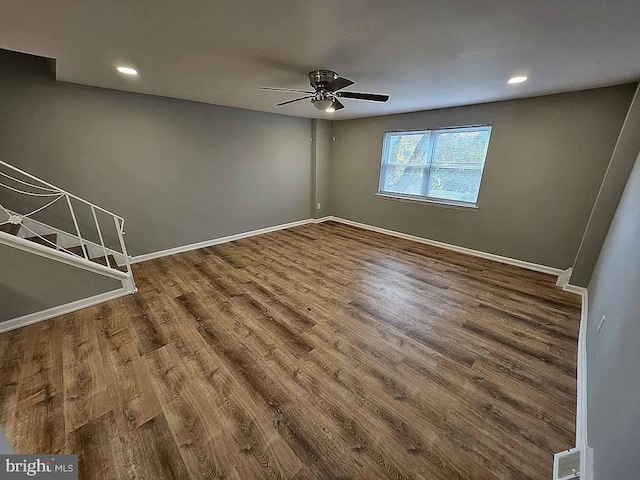 unfurnished room featuring hardwood / wood-style flooring and ceiling fan