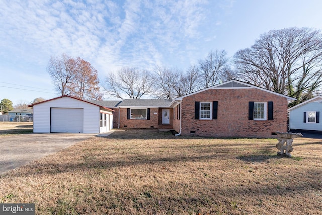 single story home featuring a front lawn and a garage